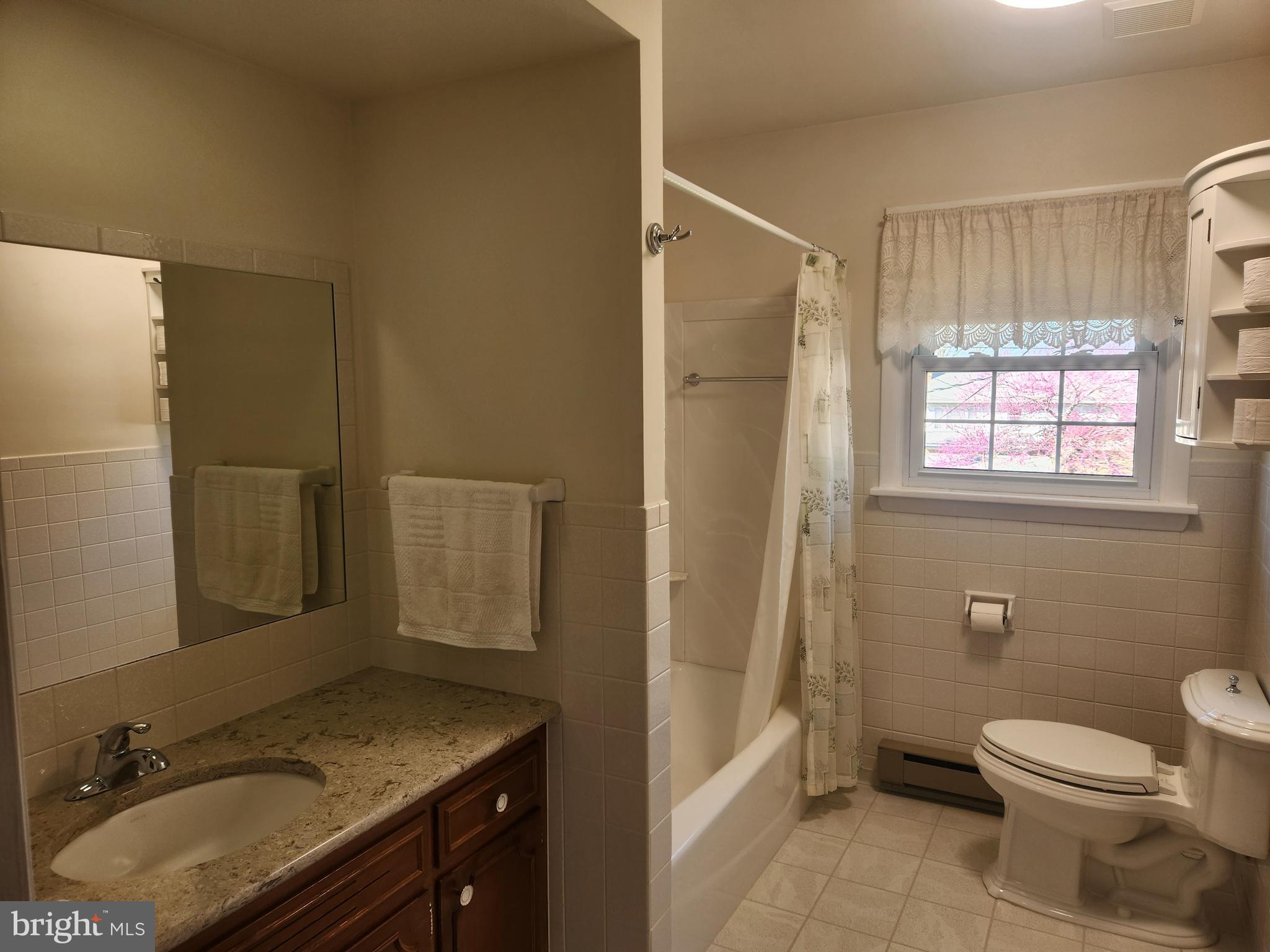 1116 Devonshire Road Lancaster, PA 17601 - Photo 8 of 70 a bathroom with a granite countertop sink toilet and shower