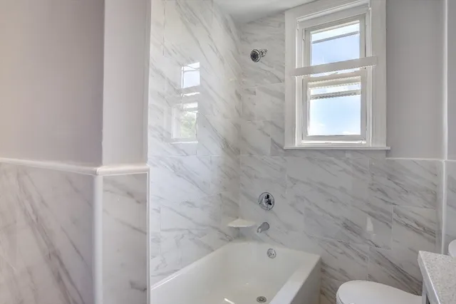 a bathroom with a sink and a bathtub