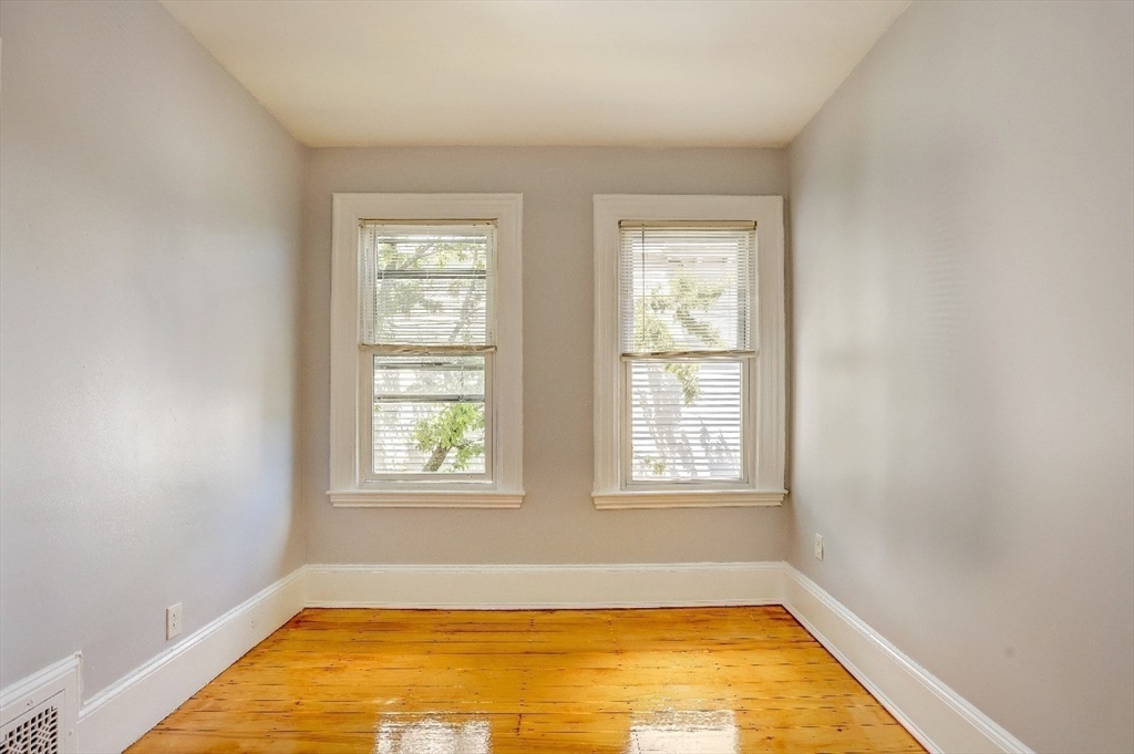 83 Topliff Street, Unit ALL Boston, MA 02122 - Photo 21 of 25 a view of a room with windows