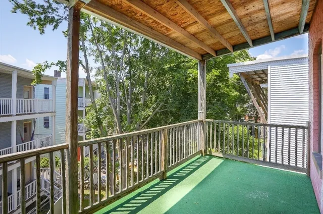 a view of a porch with a yard