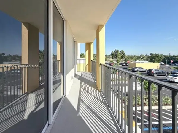 a view of a balcony with city view