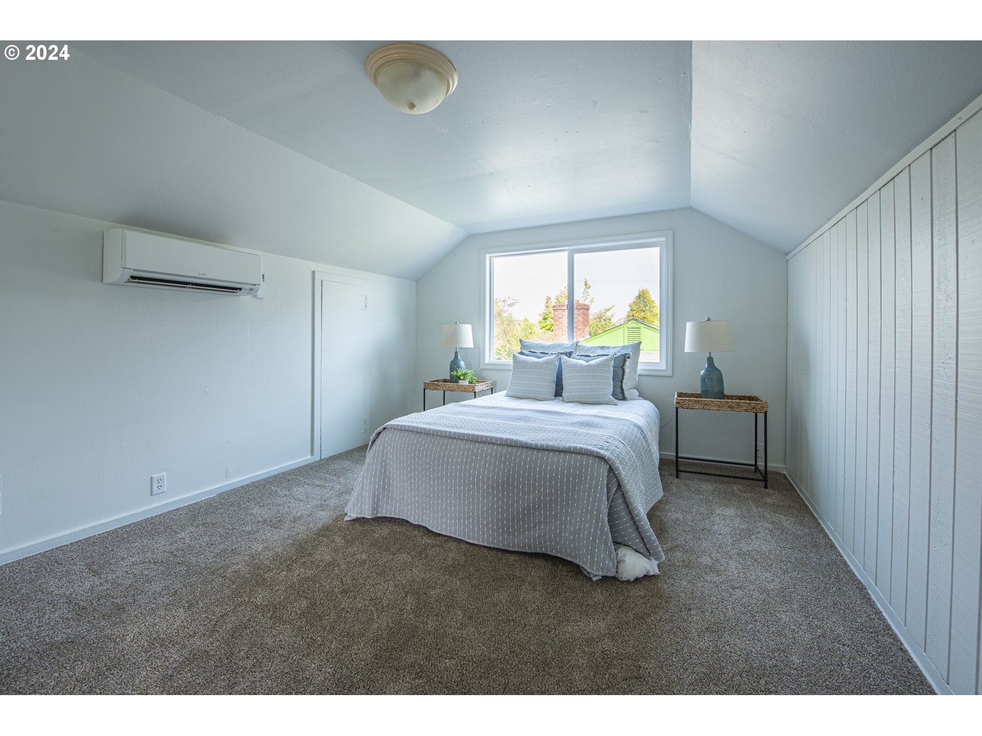 1435 Pleasant Street Springfield, OR 97477 - Photo 21 of 32 a bedroom with a bed and a window