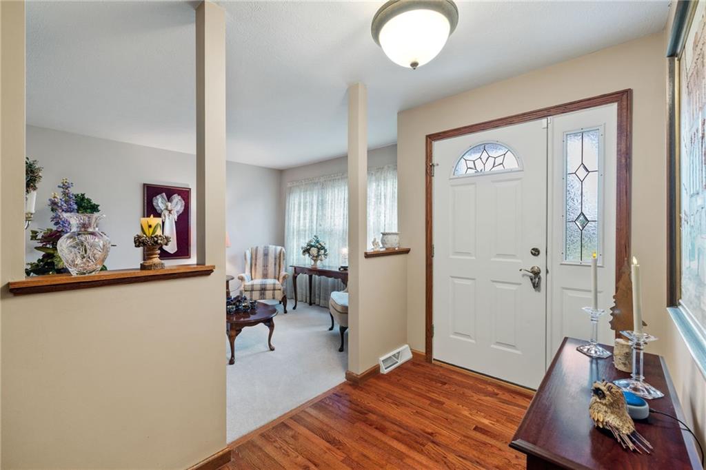 3746 Matthews Road Edinburg, PA 16116 - Photo 11 of 36 a very nice looking room with a large bed and a chandelier