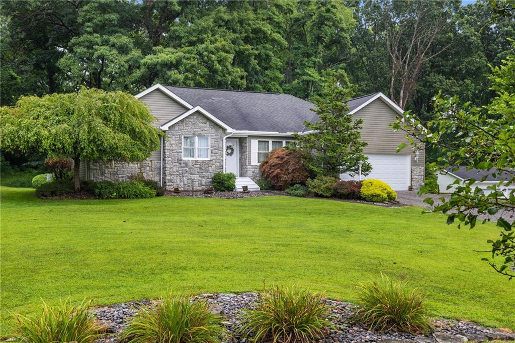 3746 Matthews Road Edinburg, PA 16116 - Photo 2 of 36 a front view of house with yard and green space