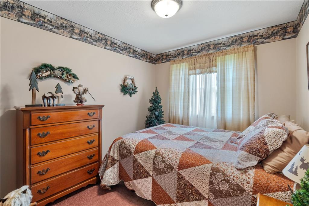 3746 Matthews Road Edinburg, PA 16116 - Photo 26 of 36 a bedroom with a bed and a window in it