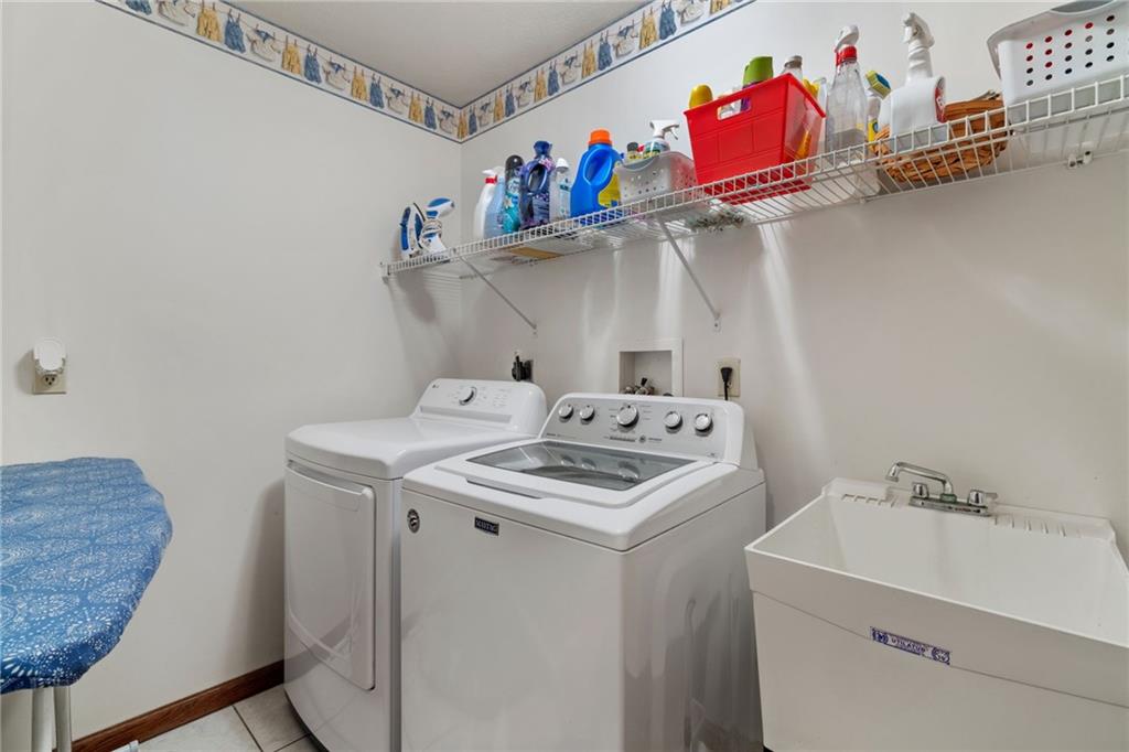 3746 Matthews Road Edinburg, PA 16116 - Photo 30 of 36 a utility room with dryer and washer
