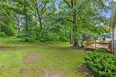 a view of a house with a big yard