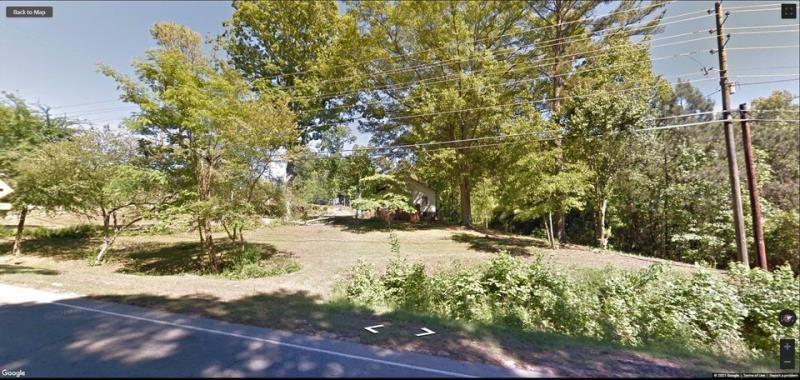 283 Villa Rica Highway Dallas, GA 30157 - Photo 2 of 4 a view of a yard with plants and trees