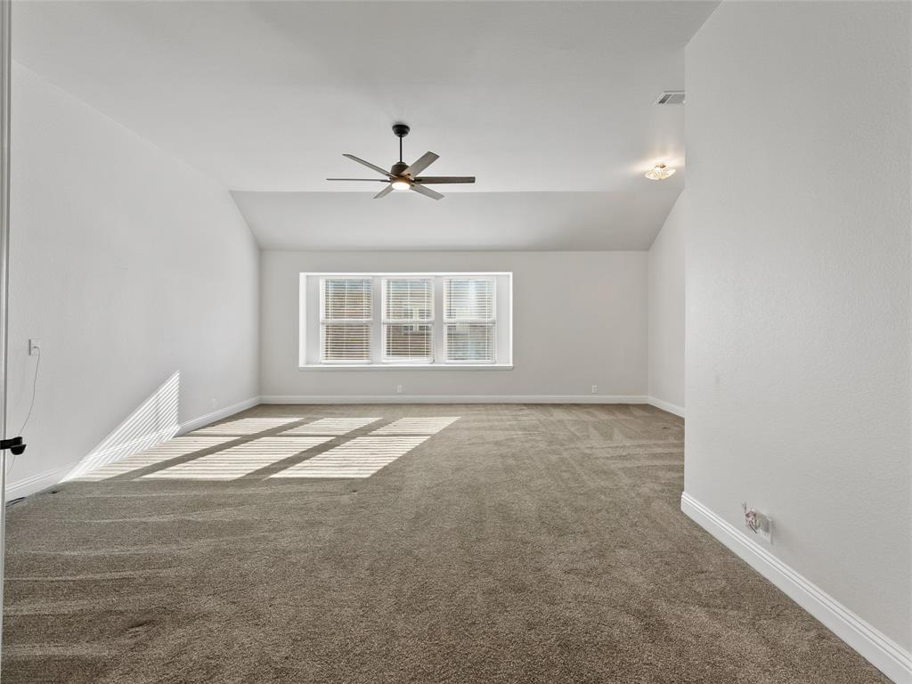 218 Calvert Drive Midlothian, TX 76065 - Photo 10 of 27 a view of an empty room with a window
