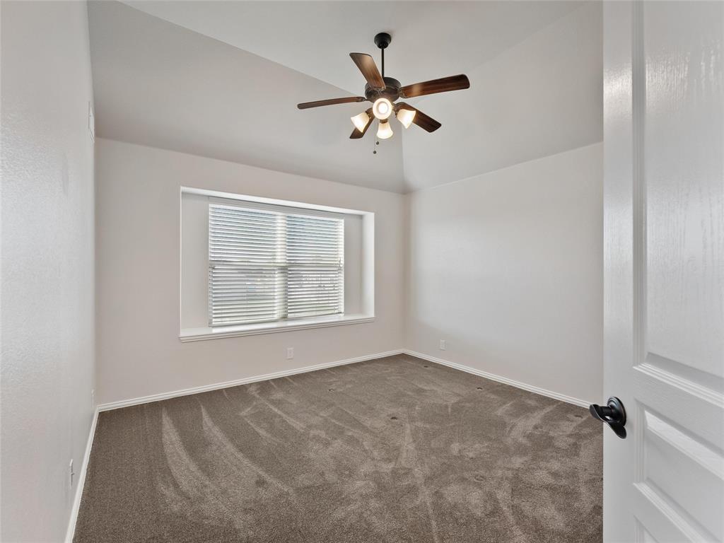 218 Calvert Drive Midlothian, TX 76065 - Photo 14 of 27 a view of an empty room with a window
