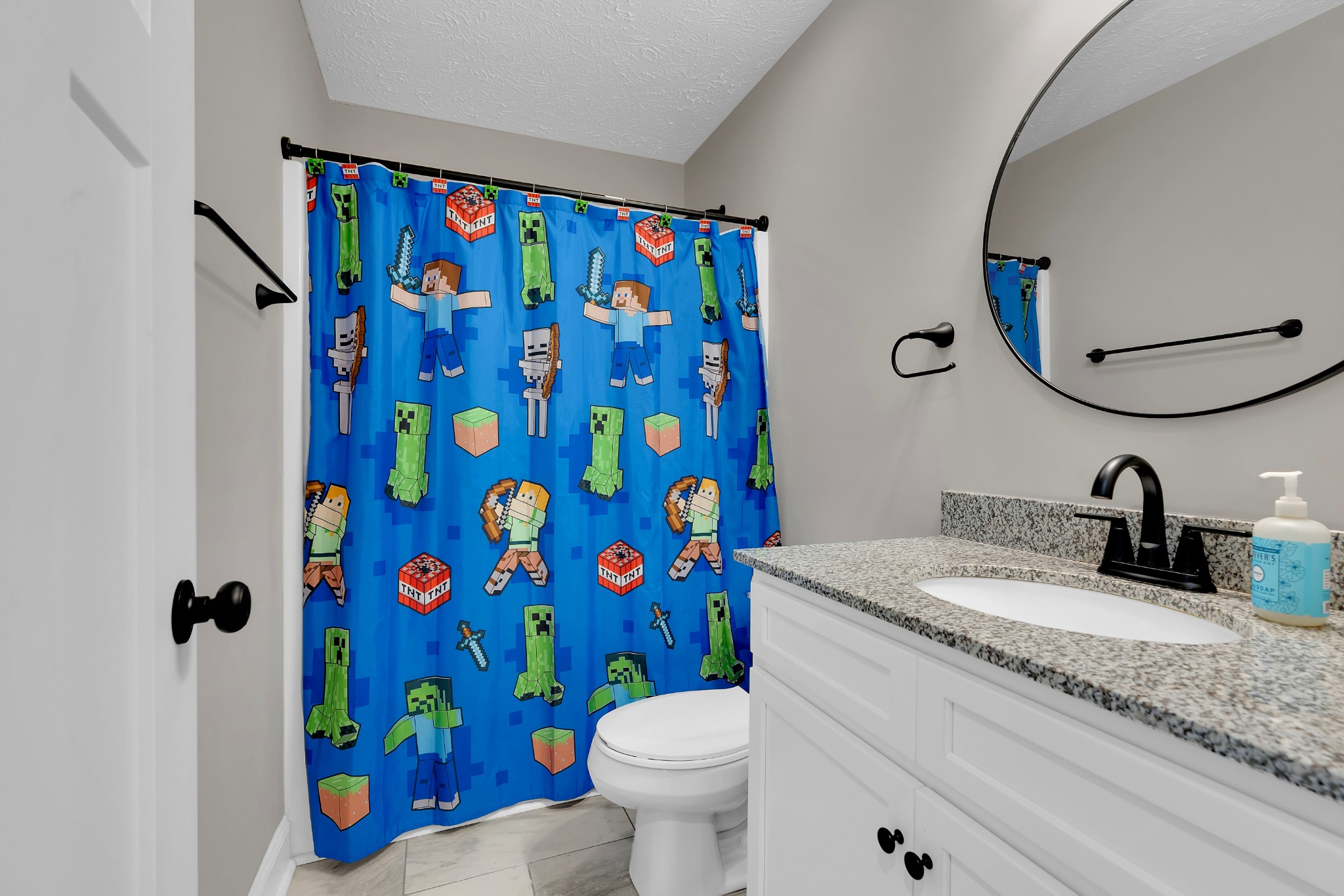 1147 Mt Herman Road Fayetteville, TN 37334 - Photo 15 of 31 a bathroom with a sink mirror vanity and toilet