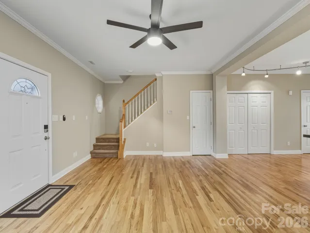 a view of a livingroom with wooden floor