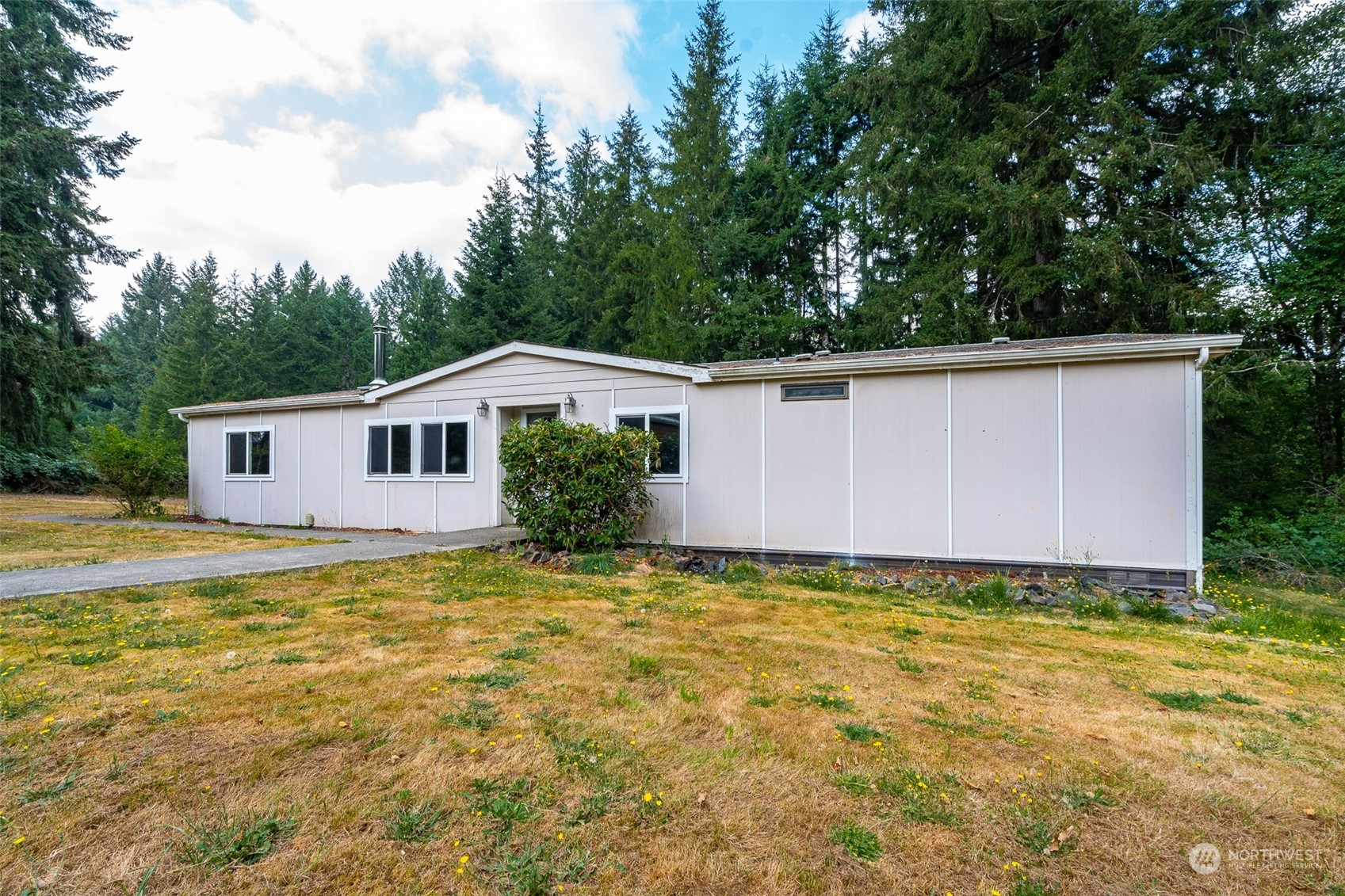 504 Brockway Road Chehalis, WA 98532 - Photo 18 of 40 a view of a house with pool and a yard