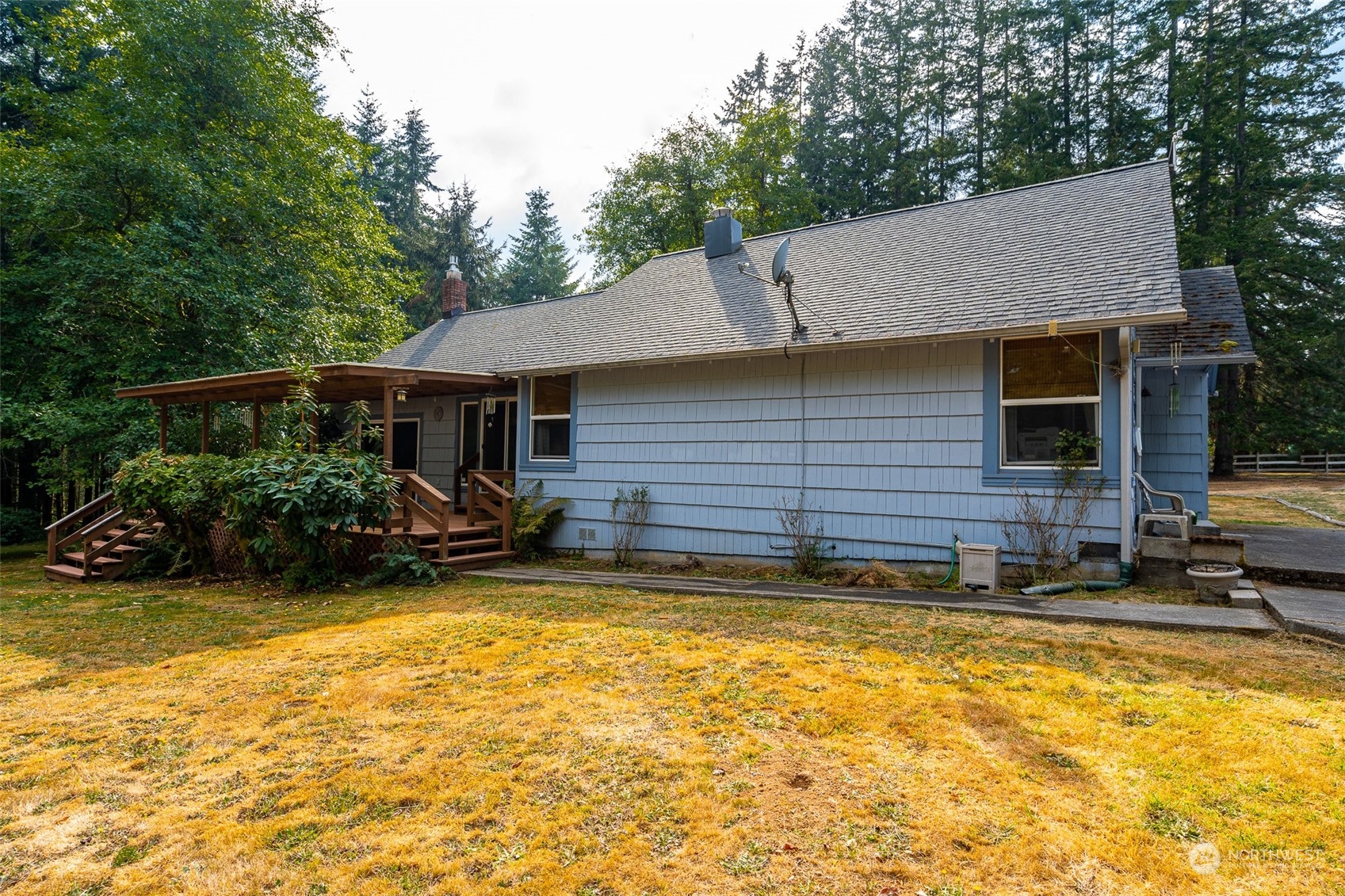 504 Brockway Road Chehalis, WA 98532 - Photo 5 of 40 a view of a house with swimming pool and sitting area
