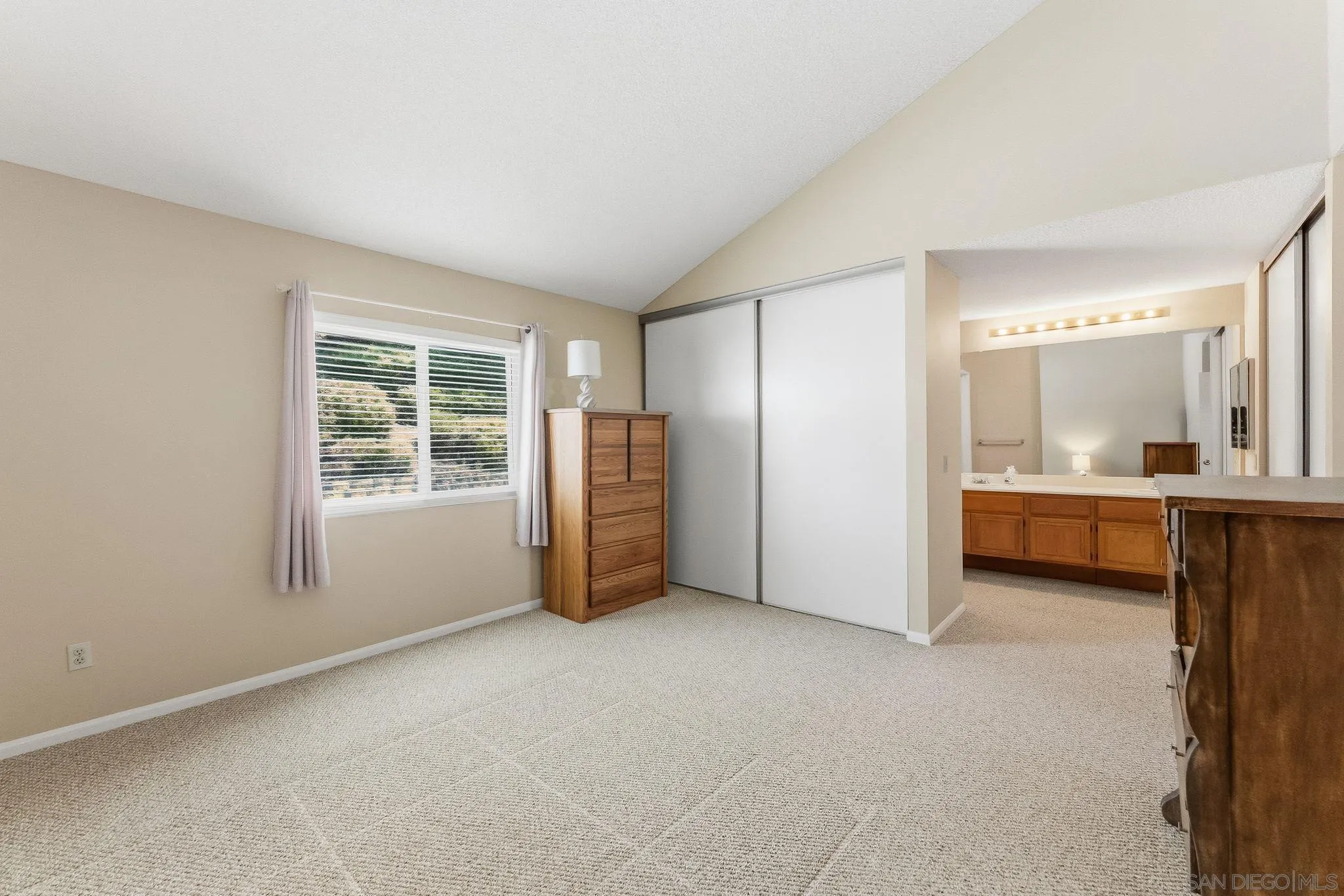 10565 Strathmore Drive Santee, CA 92071 - Photo 28 of 59 a view of an empty room with a window
