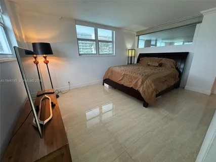 a view of a room that has a window in it