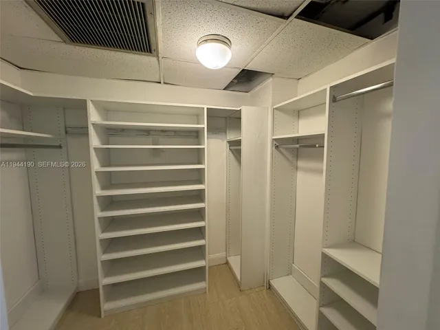 a view of a swimming pool with outdoor seating