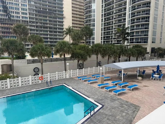 swimming pool with outdoor seating
