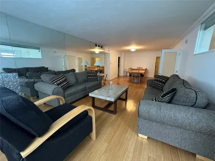 a kitchen with a sink a stove and refrigerator
