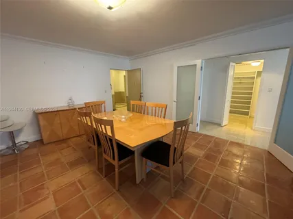 a bathroom with a sink vanity and a mirror