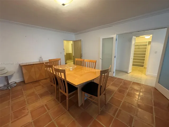 a bathroom with a sink vanity and a mirror