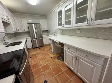 a view of swimming pool from a balcony