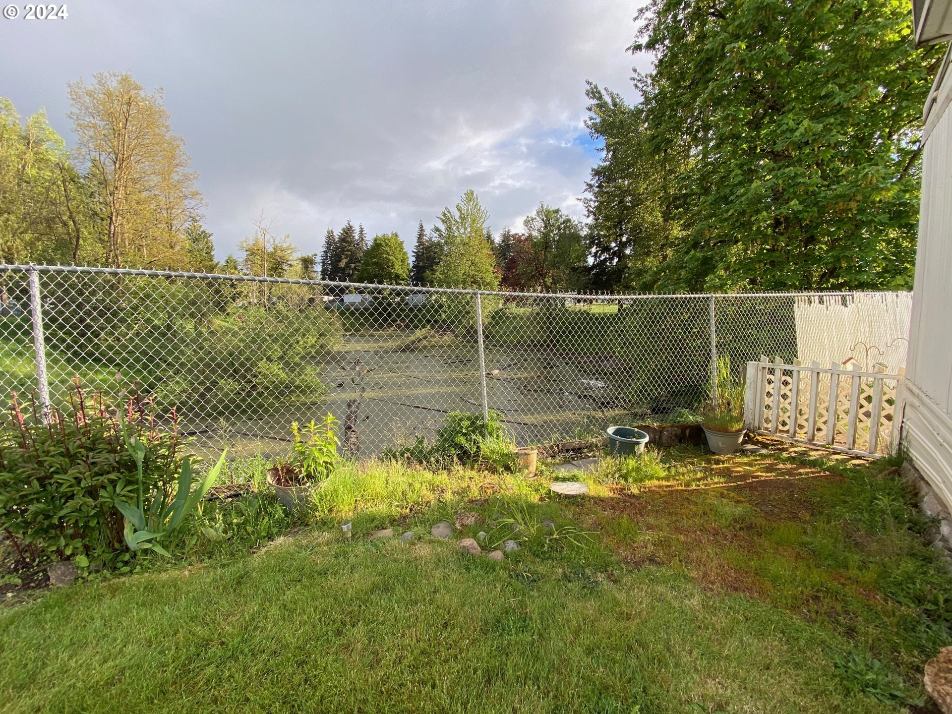 3950 Coburg Road, Unit 82 Eugene, OR 97408 - Photo 6 of 22 a view of a water pond with green space