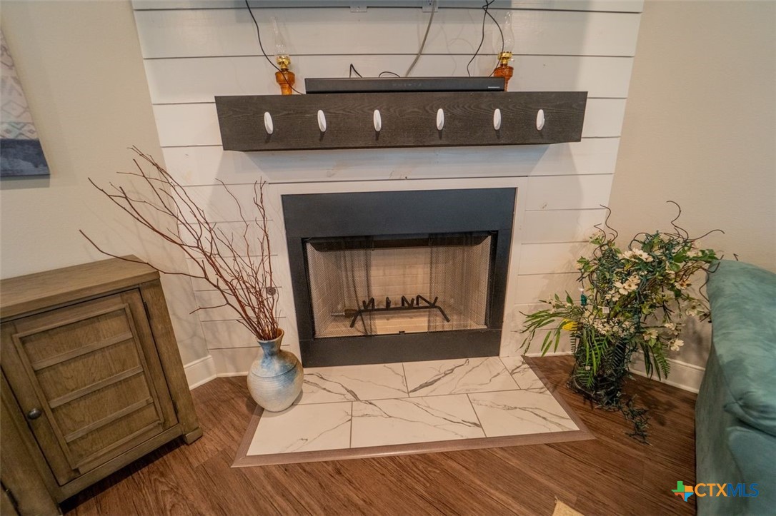 113 Terra Vista Ranch Road Victoria, TX 77904 - Photo 22 of 27 a living room with a fireplace