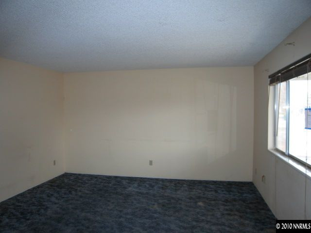 1517 Red Road Fallon, NV 89406 - Photo 2 of 13 an empty room with a window