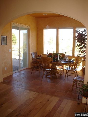 1860 Sun Shadow Court Reno, NV 89523 - Photo 3 of 9 a view of a dining room with furniture and window