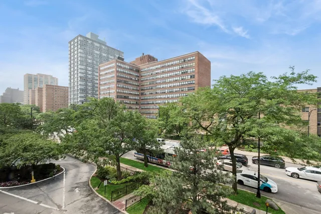 a view of a city with tall buildings