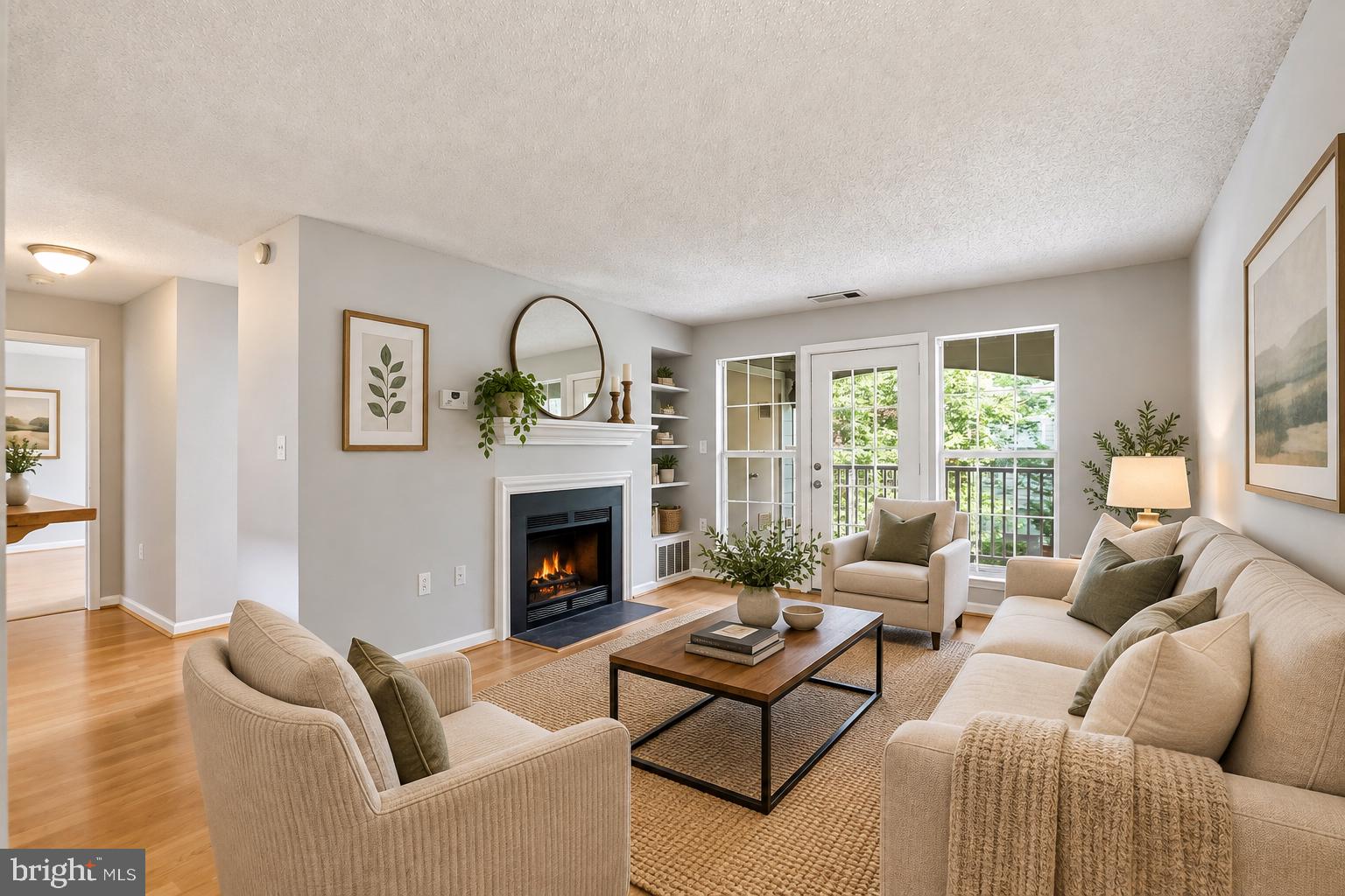 20991 Timber Ridge Terrace, Unit 203 Ashburn, VA 20147 - Photo 2 of 20 Family/Living Room Virtually Staged