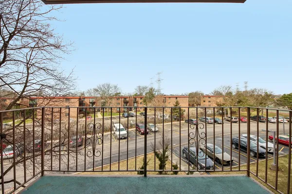 a front view of building with yard