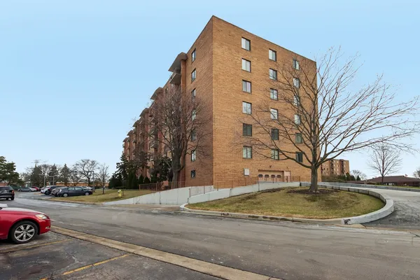 a view of building with yard