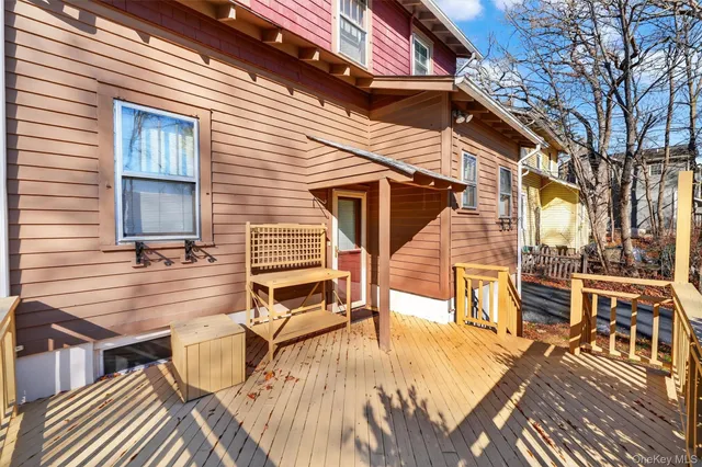 a view of a patio with a table and chairs