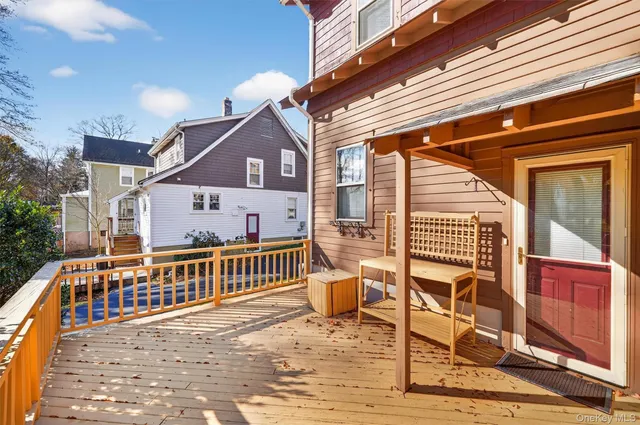 a porch with view of barbeque oven