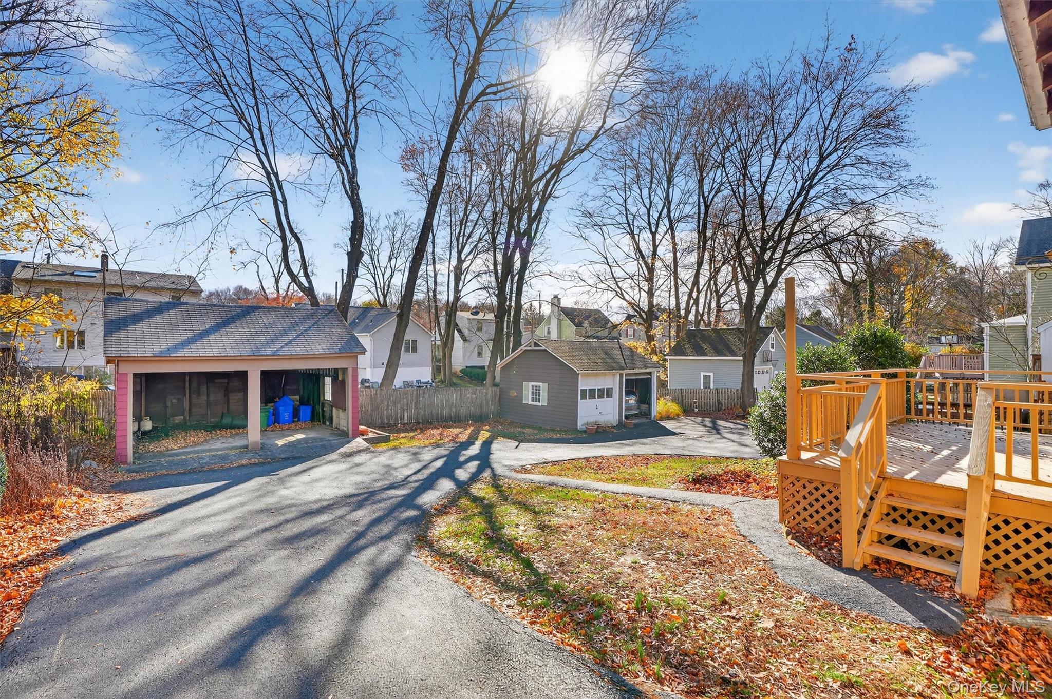 165 Wayne Avenue Suffern, NY 10901 - Photo 34 of 38 View of front facade featuring a residential view, an outbuilding, and a deck