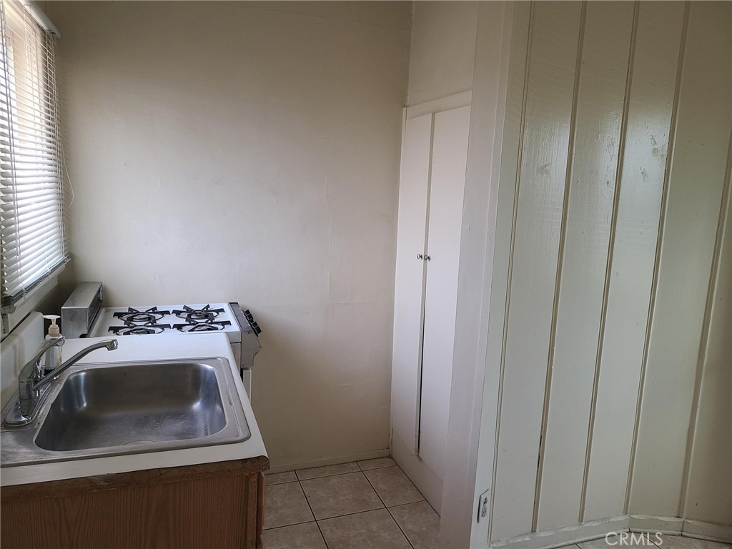 14301 Frontage Road, Unit 3 North Edwards, CA 93523 - Photo 5 of 13 a bathroom with a sink toilet and vanity