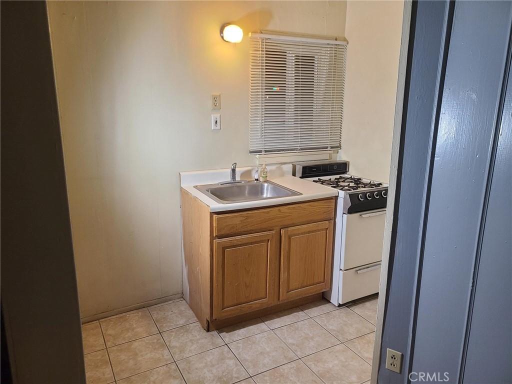 14301 Frontage Road, Unit 3 North Edwards, CA 93523 - Photo 7 of 13 a utility room with a sink washer and dryer