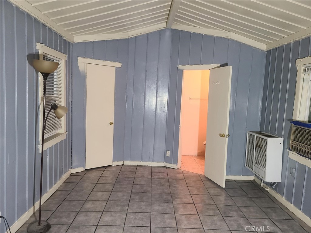 14301 Frontage Road, Unit 3 North Edwards, CA 93523 - Photo 9 of 13 a view of an empty room and fire place