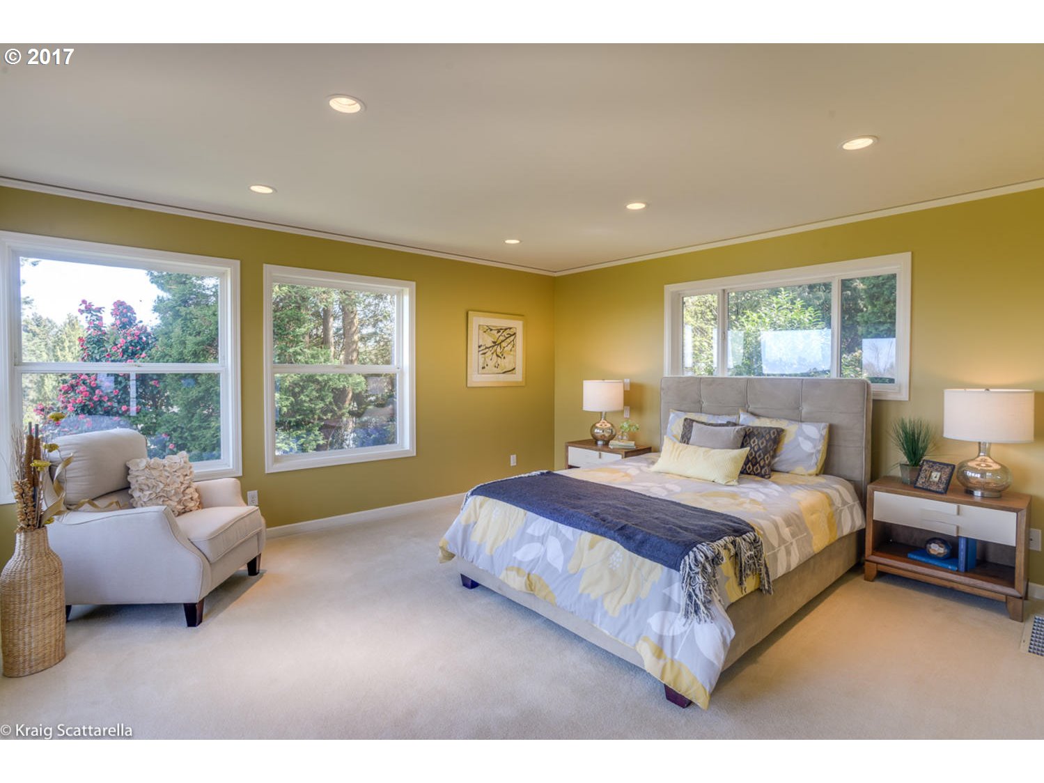8220 Southwest 3rd Avenue Portland, OR 97219 - Photo 12 of 32 a spacious bedroom with a bed and a couch