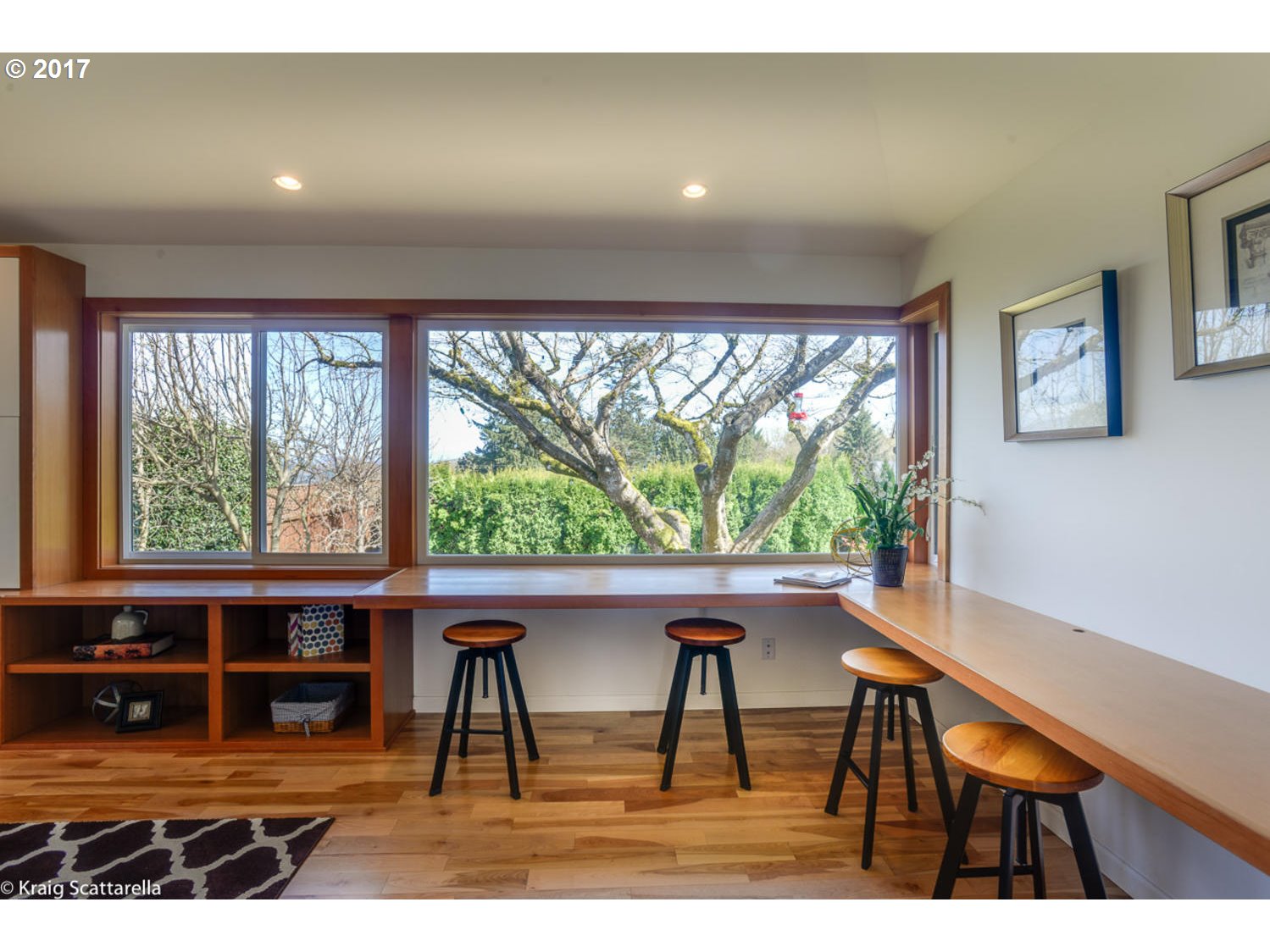 8220 Southwest 3rd Avenue Portland, OR 97219 - Photo 18 of 32 a living room with large windows