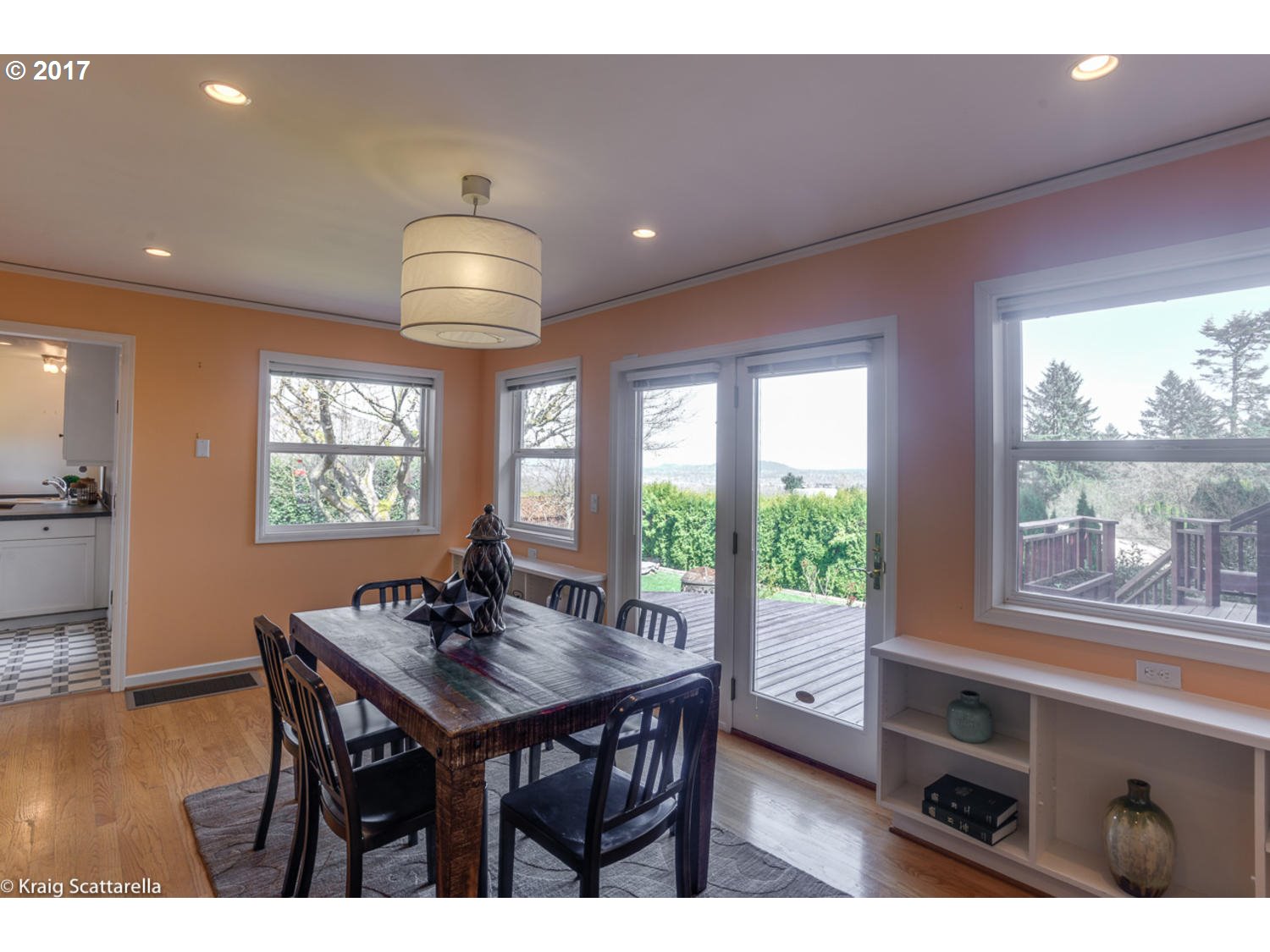 8220 Southwest 3rd Avenue Portland, OR 97219 - Photo 6 of 32 a dining room with furniture window wooden floor