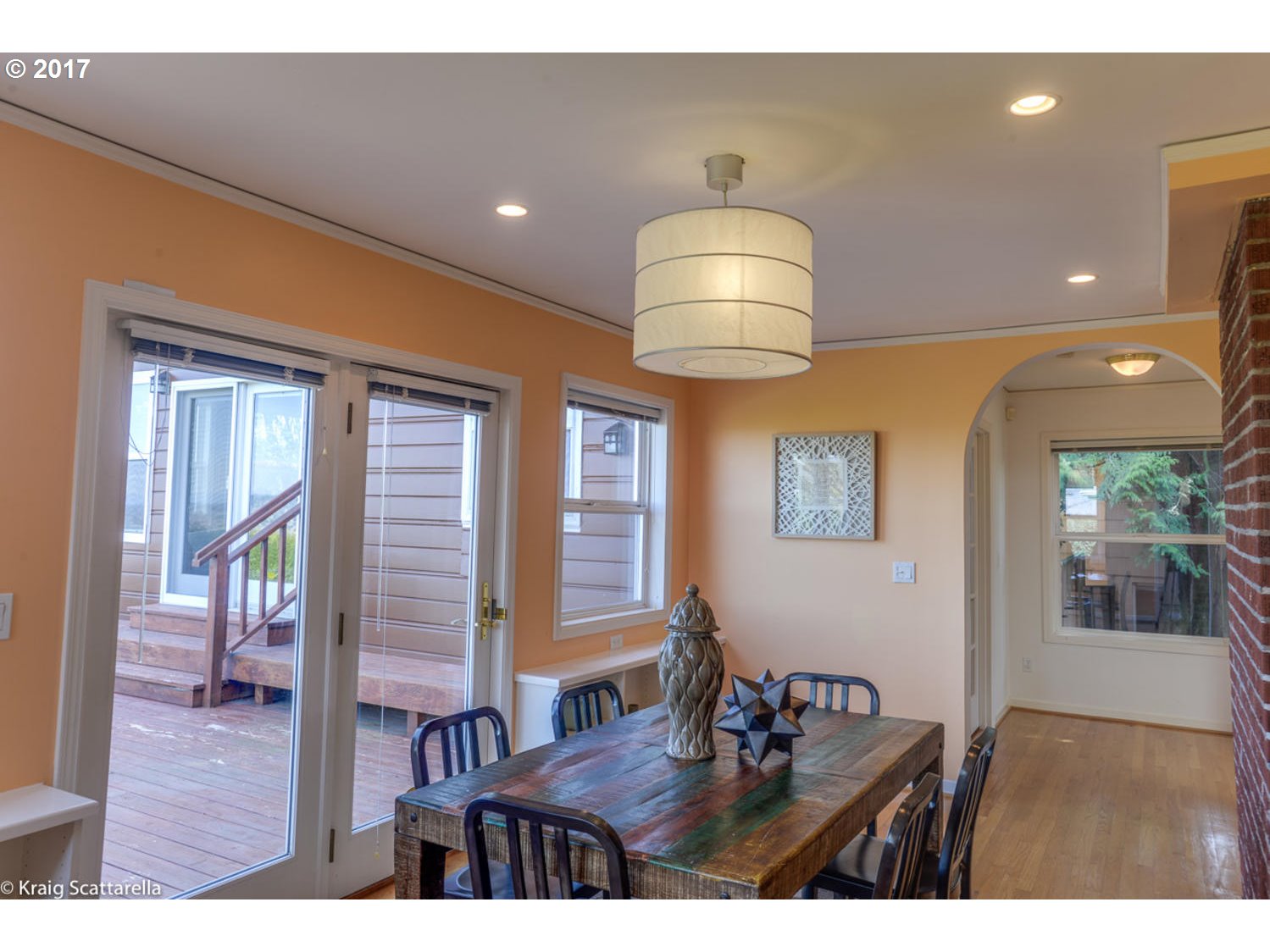 8220 Southwest 3rd Avenue Portland, OR 97219 - Photo 7 of 32 a kitchen view of a dining table chairs and chandelier