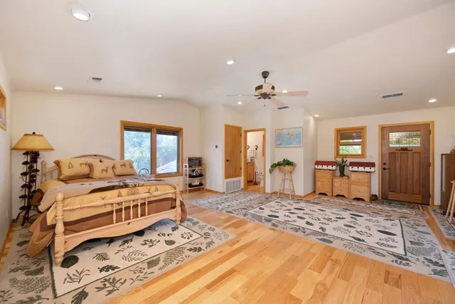 an aerial view of a house with a yard and garden