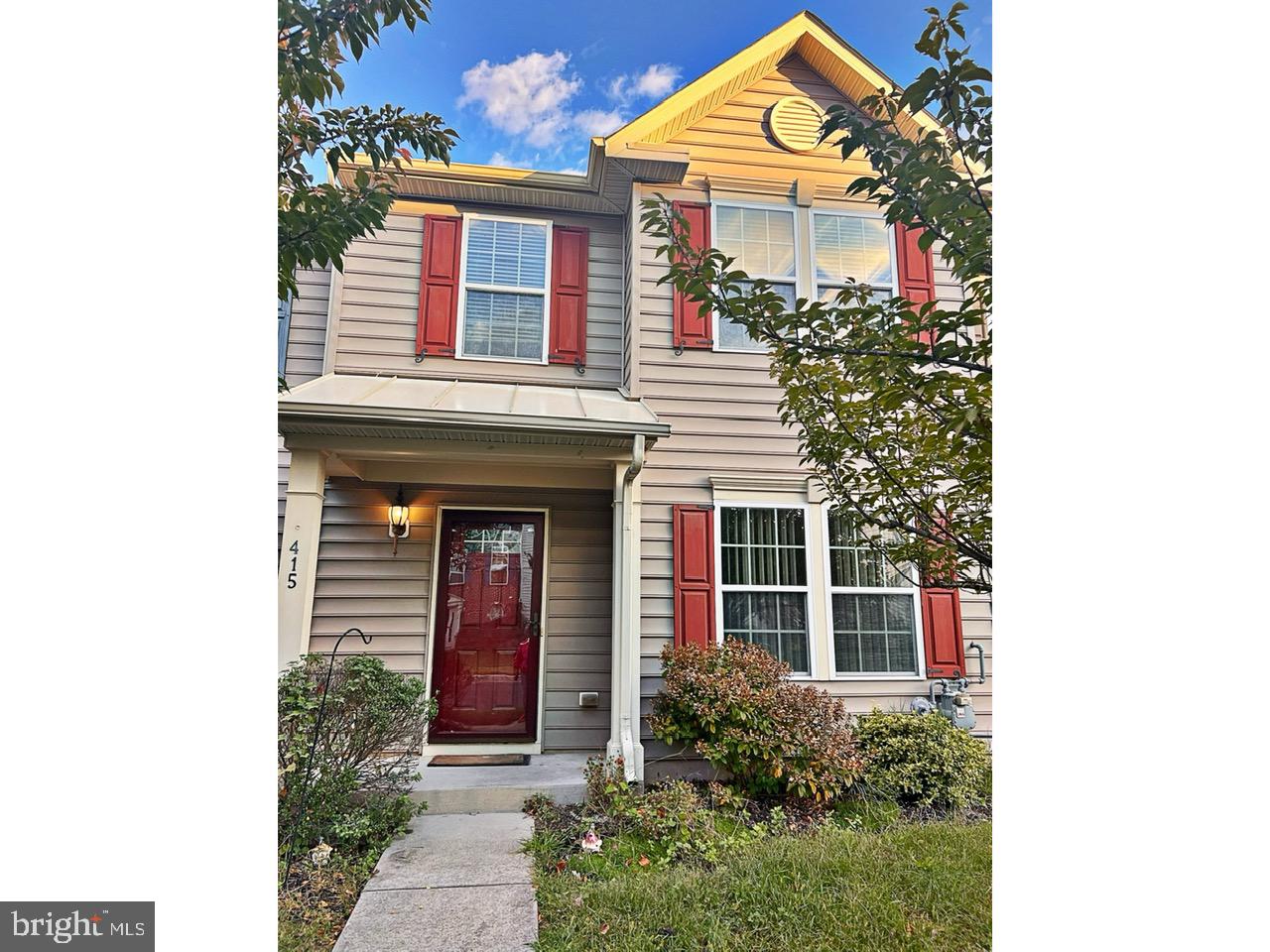 a front view of a house with a porch