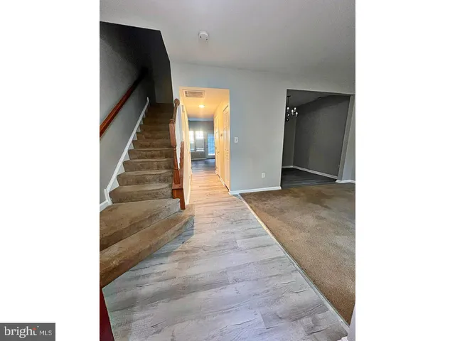 a view of hallway with stairs