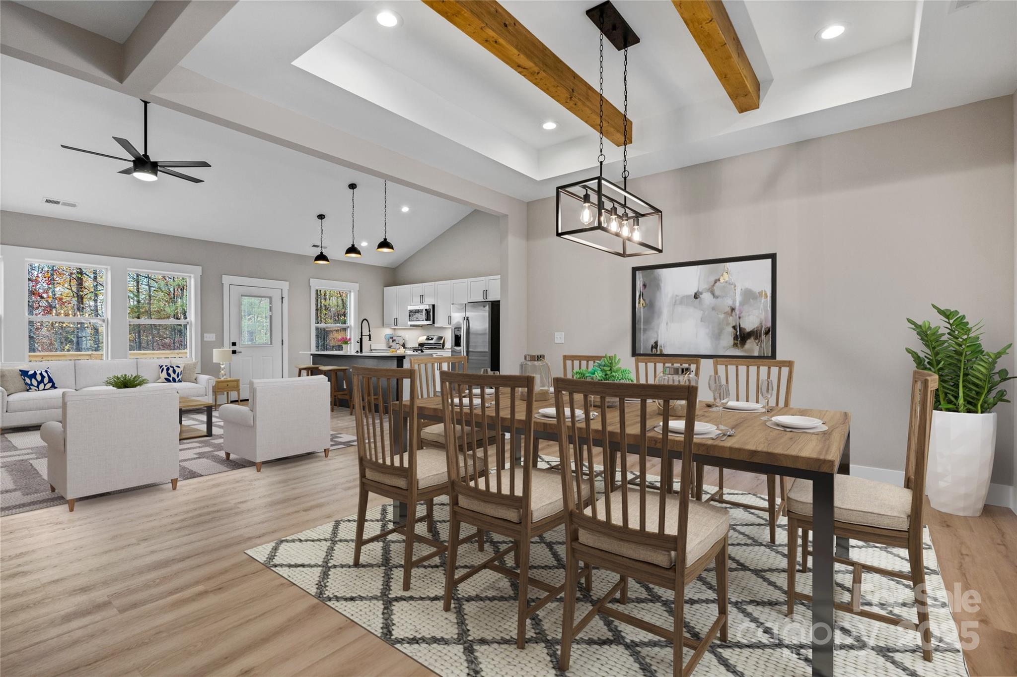 446 Old Buckeye Cove Road Swannanoa, NC 28778 - Photo 11 of 48 a view of a dining room with furniture and wooden floor