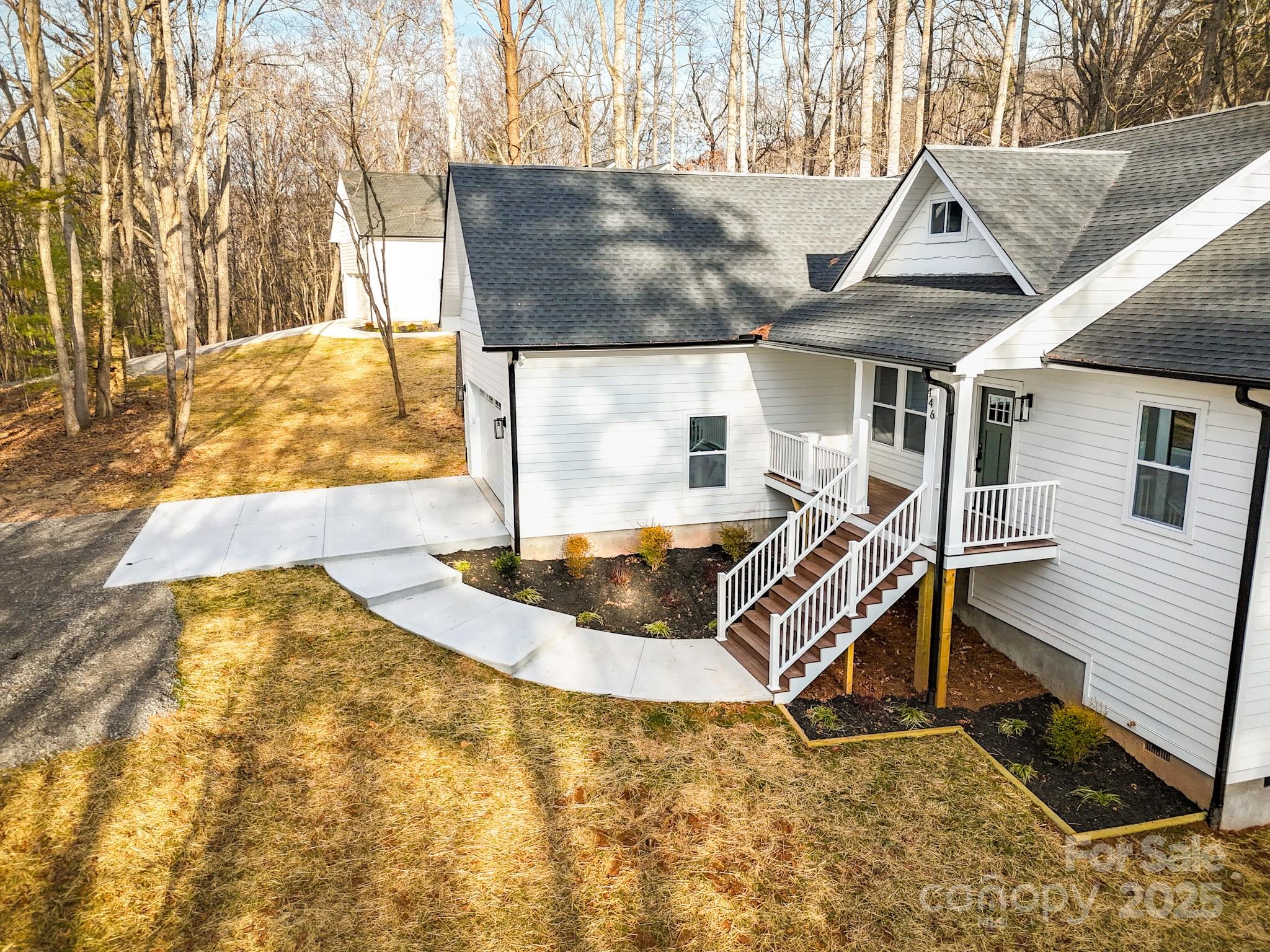 446 Old Buckeye Cove Road Swannanoa, NC 28778 - Photo 4 of 48 a view of outdoor space yard deck and living room