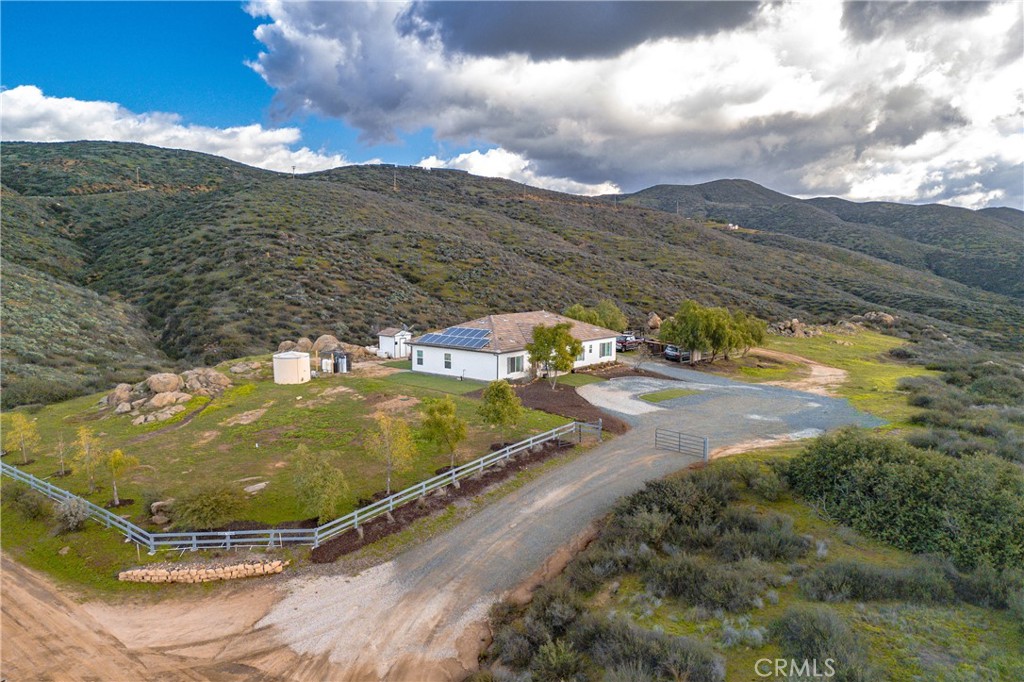 40105 Voyager Road Hemet, CA 92544 - Photo 16 of 27 a view of a pool with a yard